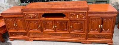 Kệ tivi chạm khuyên tròn mõ lồi gỗ hương đá